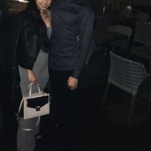 Bluish grey flared jumpsuit with cross cross back